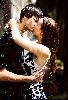 Kissing_in_fake_rain_by_The_Rob.jpg